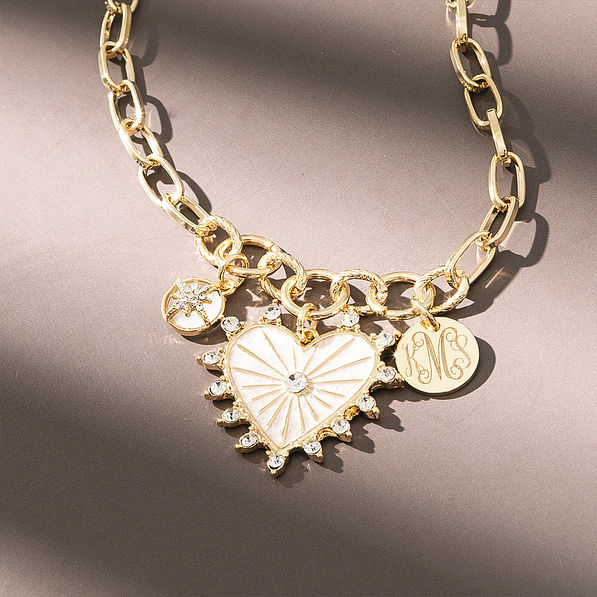 Heart charm necklace on brown detail shot