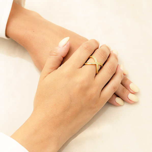 gold adjustable criss cross ring on hands