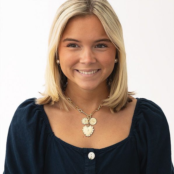 Girl Wearing Sun Heart Necklace