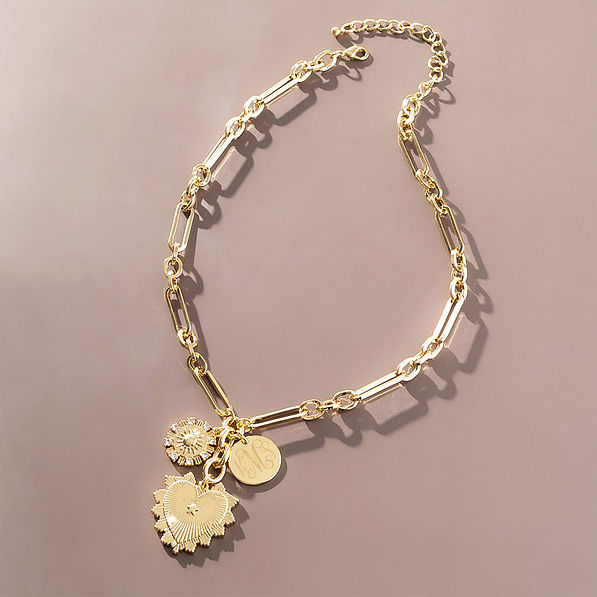 Sun Heart Necklace on brown