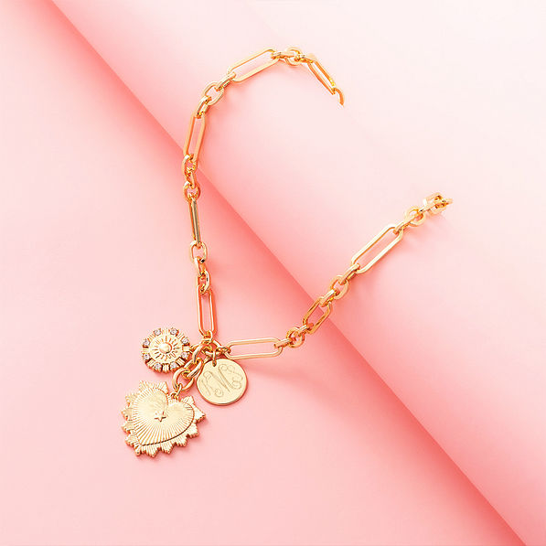 sun heart necklace on pink