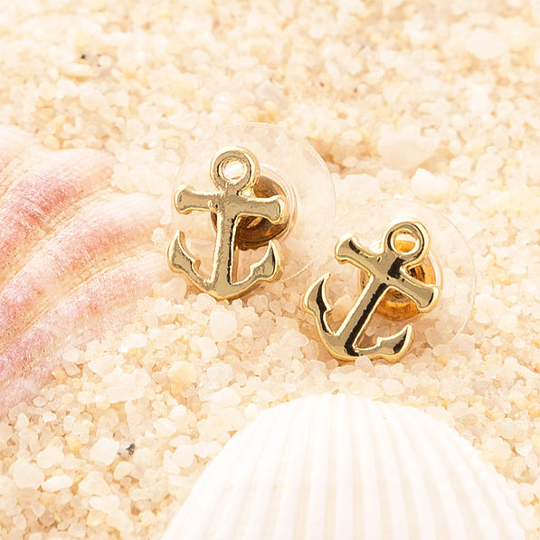 anchor earrings in sand