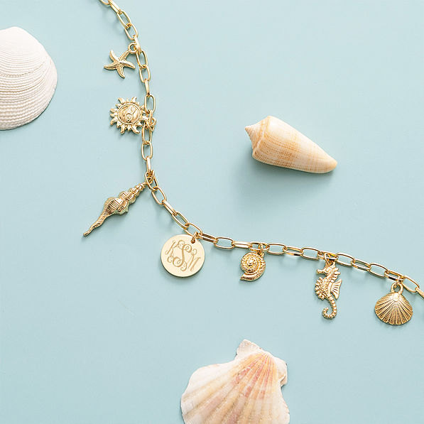 Seashell Charm Necklace on blue