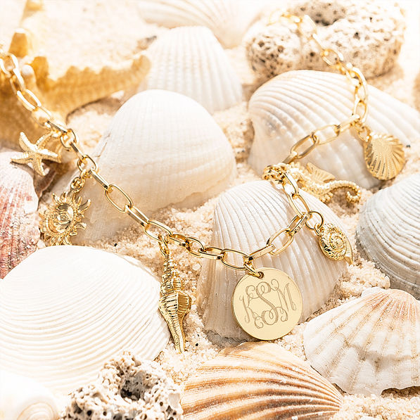 Seashell Charm Necklace on shells