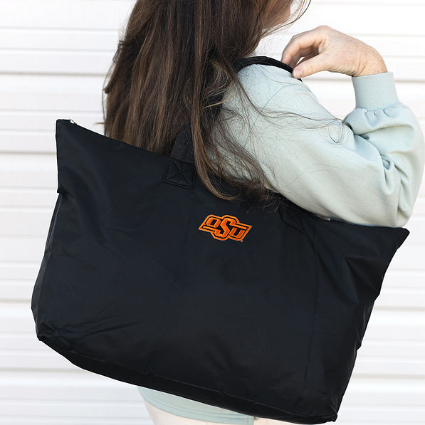 duffel bag on shoulder