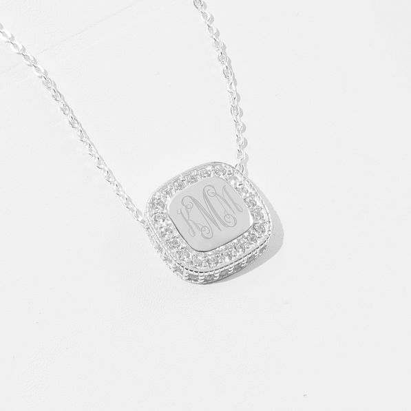 Silver chain and silver mirrored monogrammed disc