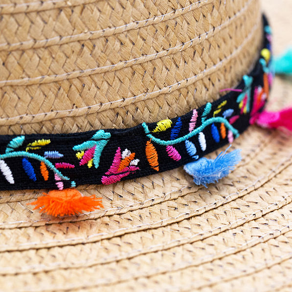 black headband with colorful mexicali design and multicolor tassels