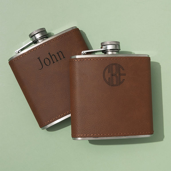 duo of personalized leather wrapped flasks