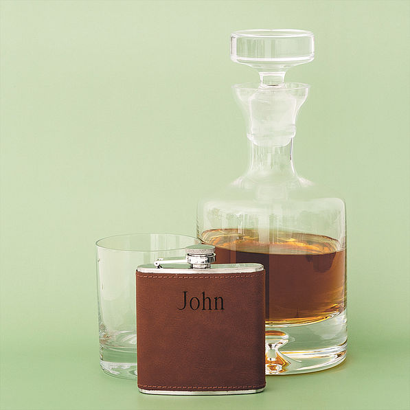 personalized leather wrapped flask with liquor