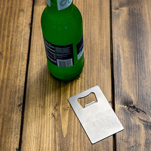 Engraved Bottle Opener on table with soda bottle