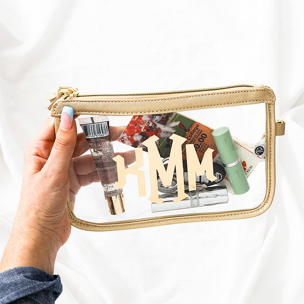 Monogrammed Clear Stadium Wristlet packed for a sporting event