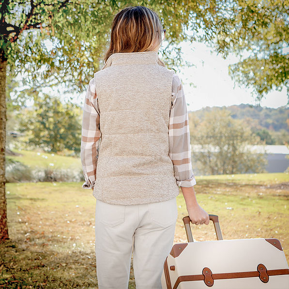 back of oatmeal heathered quilted vest