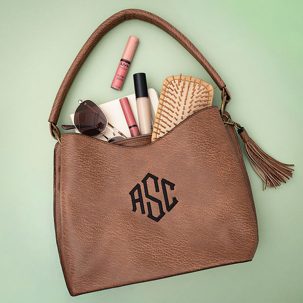 camel brown cheyenne purse flatlay