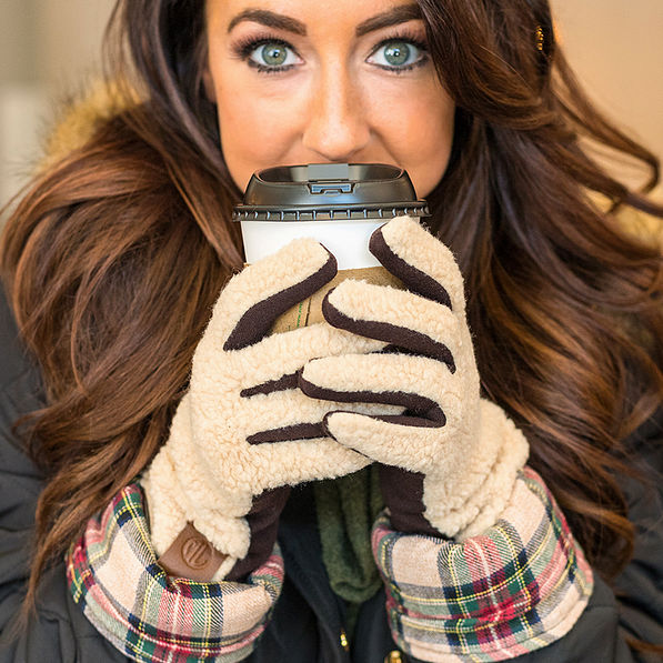 sherpa gloves on girl holding coffee in plaid jacket