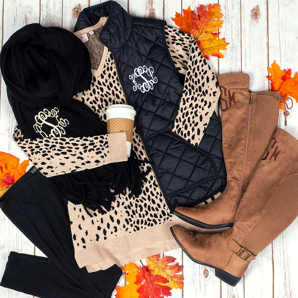monogrammed leopard sweater tunic with monogrammed puffy vest, monogrammed riding boots and monogrammed oversized fringe scarf