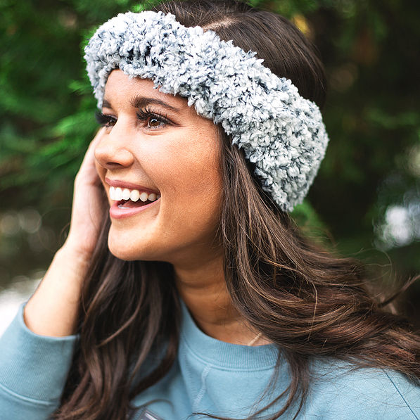 charcoal sherpa ear band on brown hair