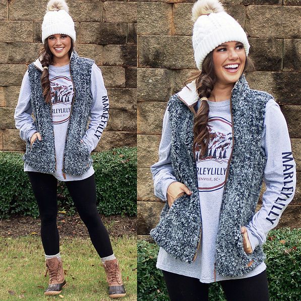 heathered sherpa vest with vintage mountain tee and monogrammed duck boots