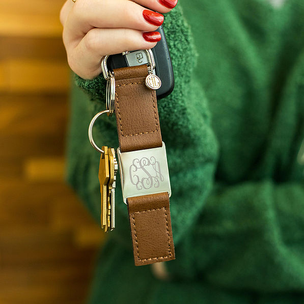leather key chain with olive boyfriend sweater