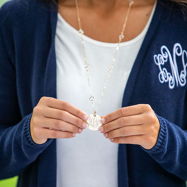 long monogrammed pave necklace with navy fringe cardigan