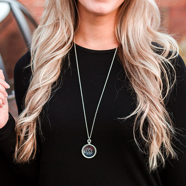 monogrammed silver rope pendant necklace on neck