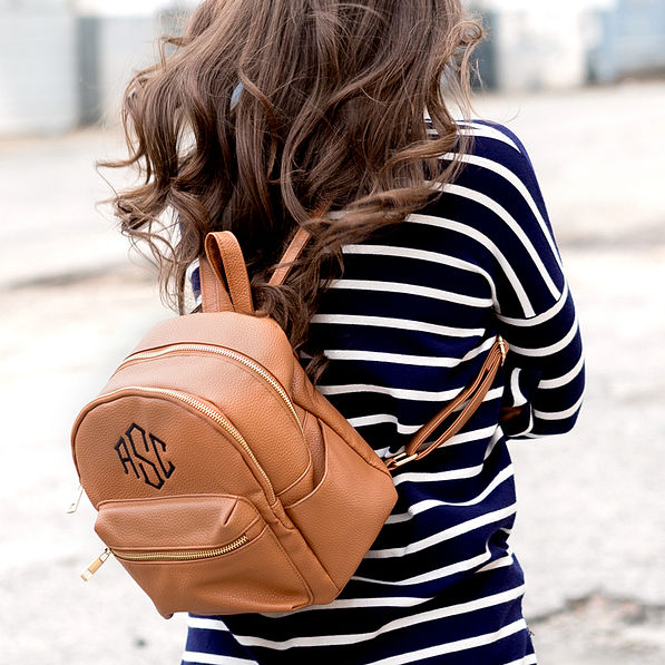 monogrammed mini faux leather backpack with striped sweater