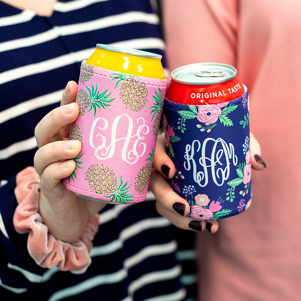 girls holding sodas with monogrammed velcro drink insulators