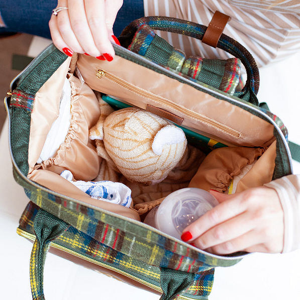inside of olive plaid diaper backpack