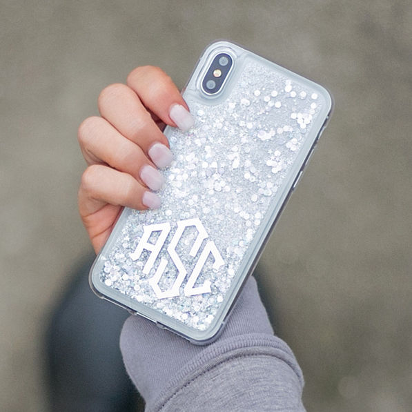 silver glitter phone in front of marble