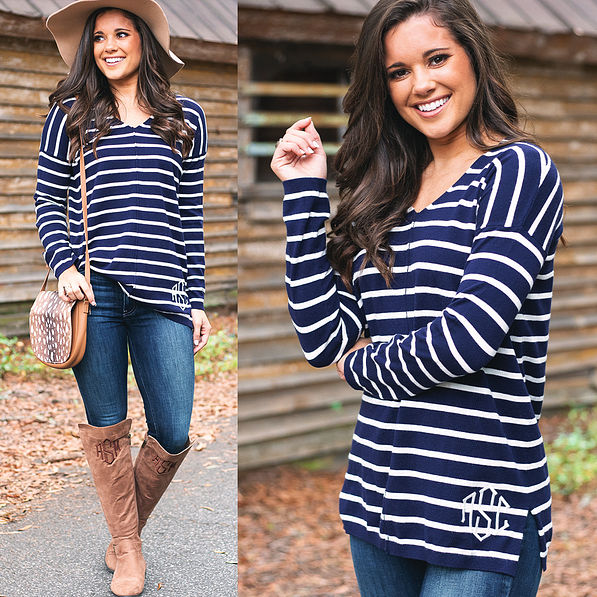 monogrammed striped v-neck sweater with jeans and riding boots