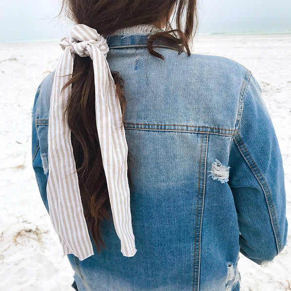 seersucker ribbon scrunchie on beach with jean jacket