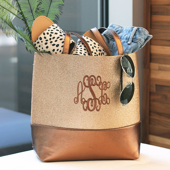 monogrammed gold glitter tote with leopard sandals and denim shorts packed