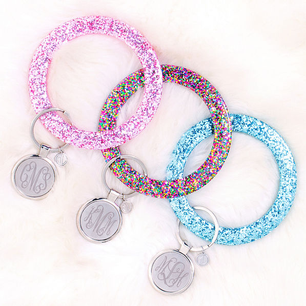 monogrammed confetti key rings in pink, multi, and aqua