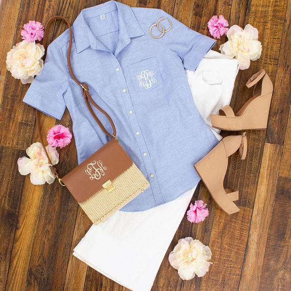 preppy outfit with monogrammed collared blue top and white flare jeans