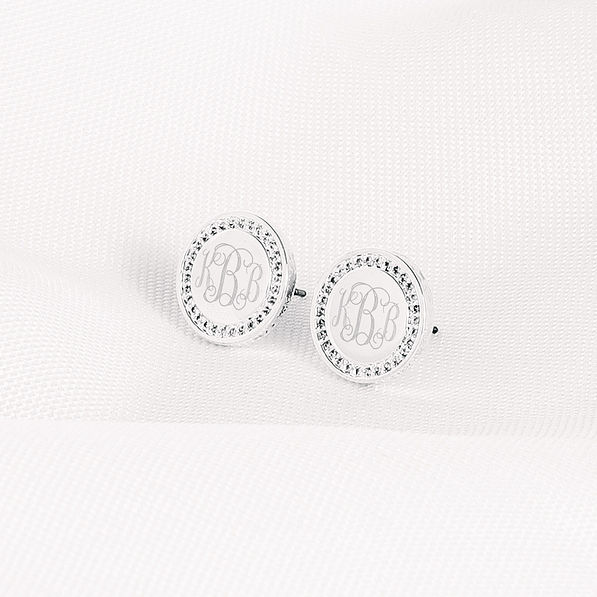 silver personalized disc earrings on cloth