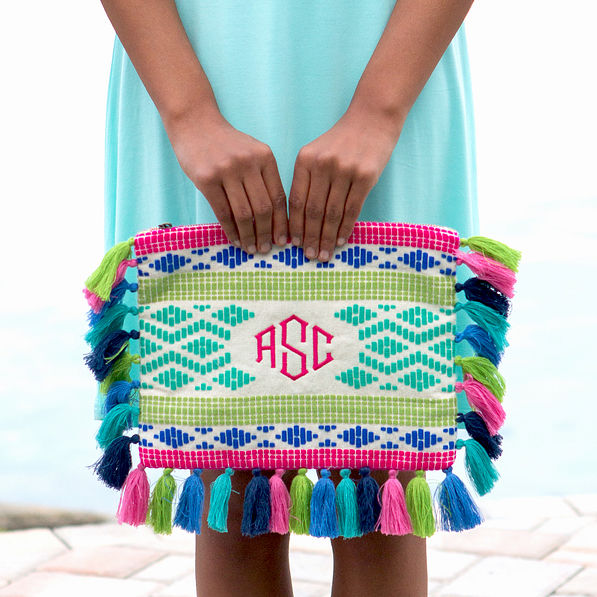 girl in aqua dress holding monogrammed geo tote
