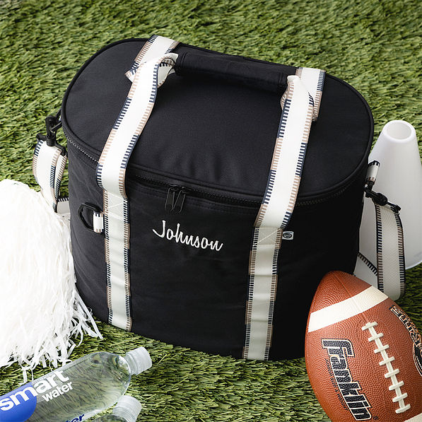 eclipse cooler on grass with football