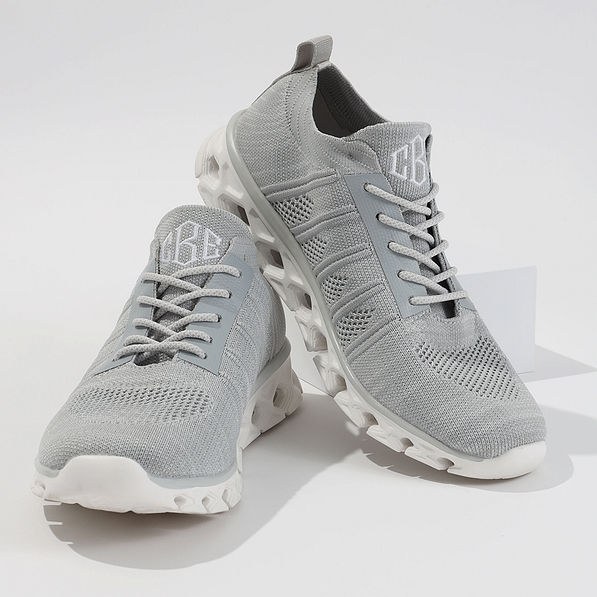 athleisure sneakers stacked in studio