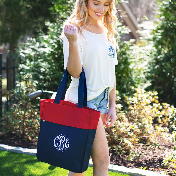 monogrammed colorblock tote in red and navy on arm