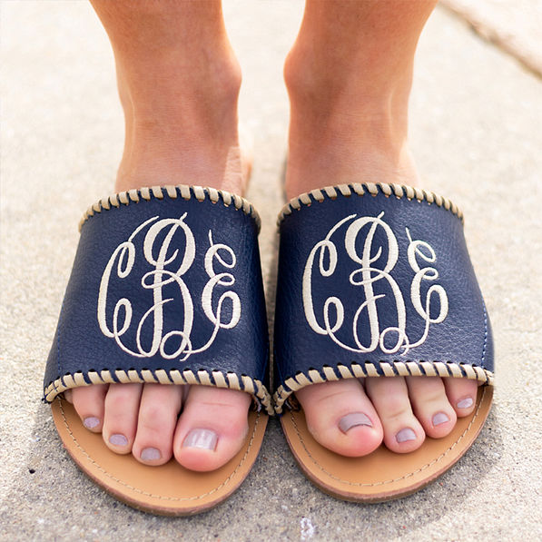 navy whipstitch sandal toppers on sandal outside