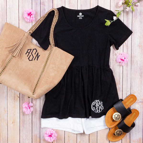 monogrammed black peplum tshirt with suede purse sandals and pink flowers