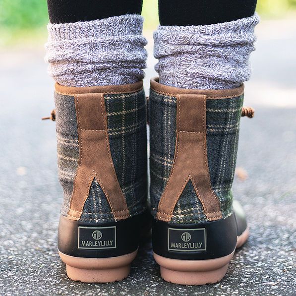 back of charcoal plaid monogrammed duck boots with duck boot socks