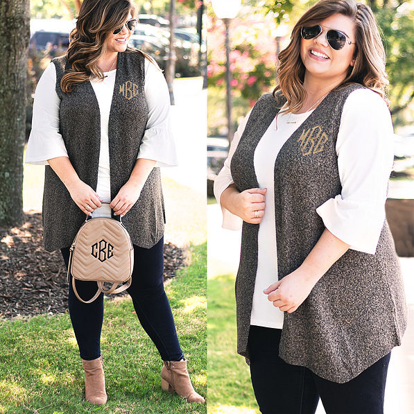 plus size model in monogrammed knit vest with bell sleeve top
