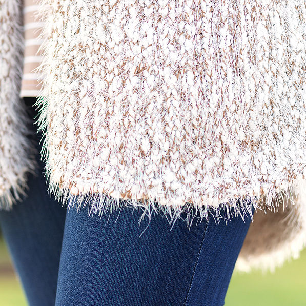 close up of cozy knit vest fabric