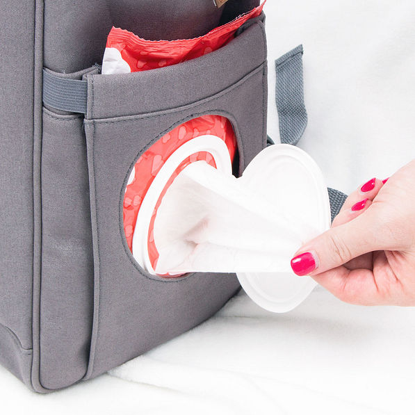 side easy access wipes pocket on gray monogrammed diaper backpack