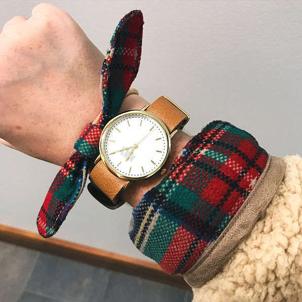 plaid bow on wrist with monogrammed watch