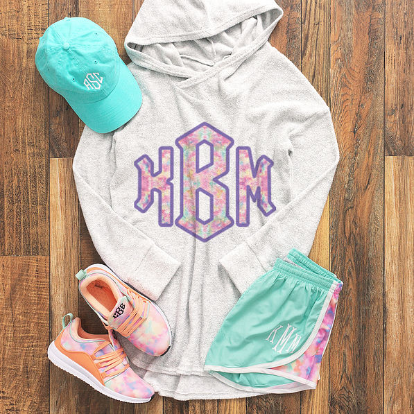 monogrammed terry hoodie with tie dye design and running shorts