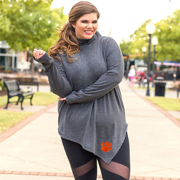 girl wearing leggings and clemson long sleeved tunic