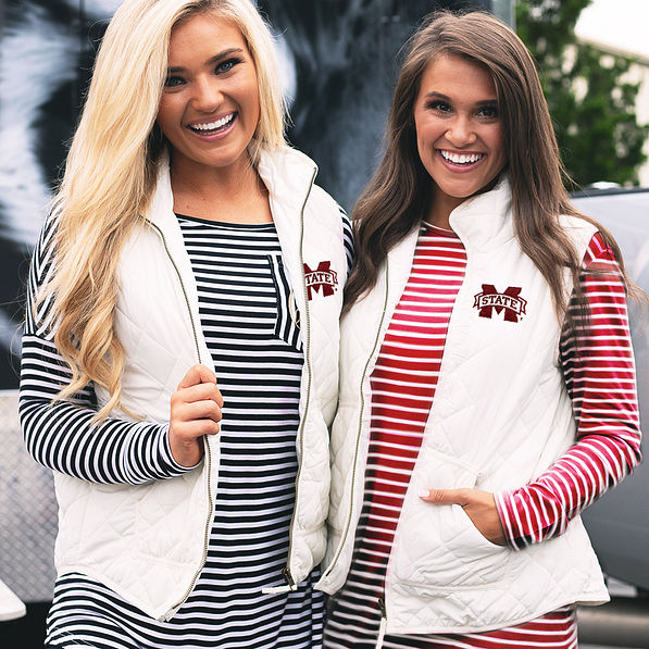 girls in mississippi state puffy vests with striped tees