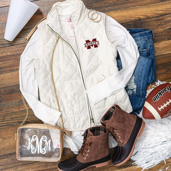mississippi state gameday outfit with puffy vest and duck boots