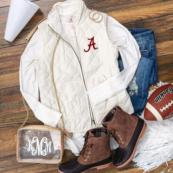 alabama gameday outfit with puffy vest and duck boots